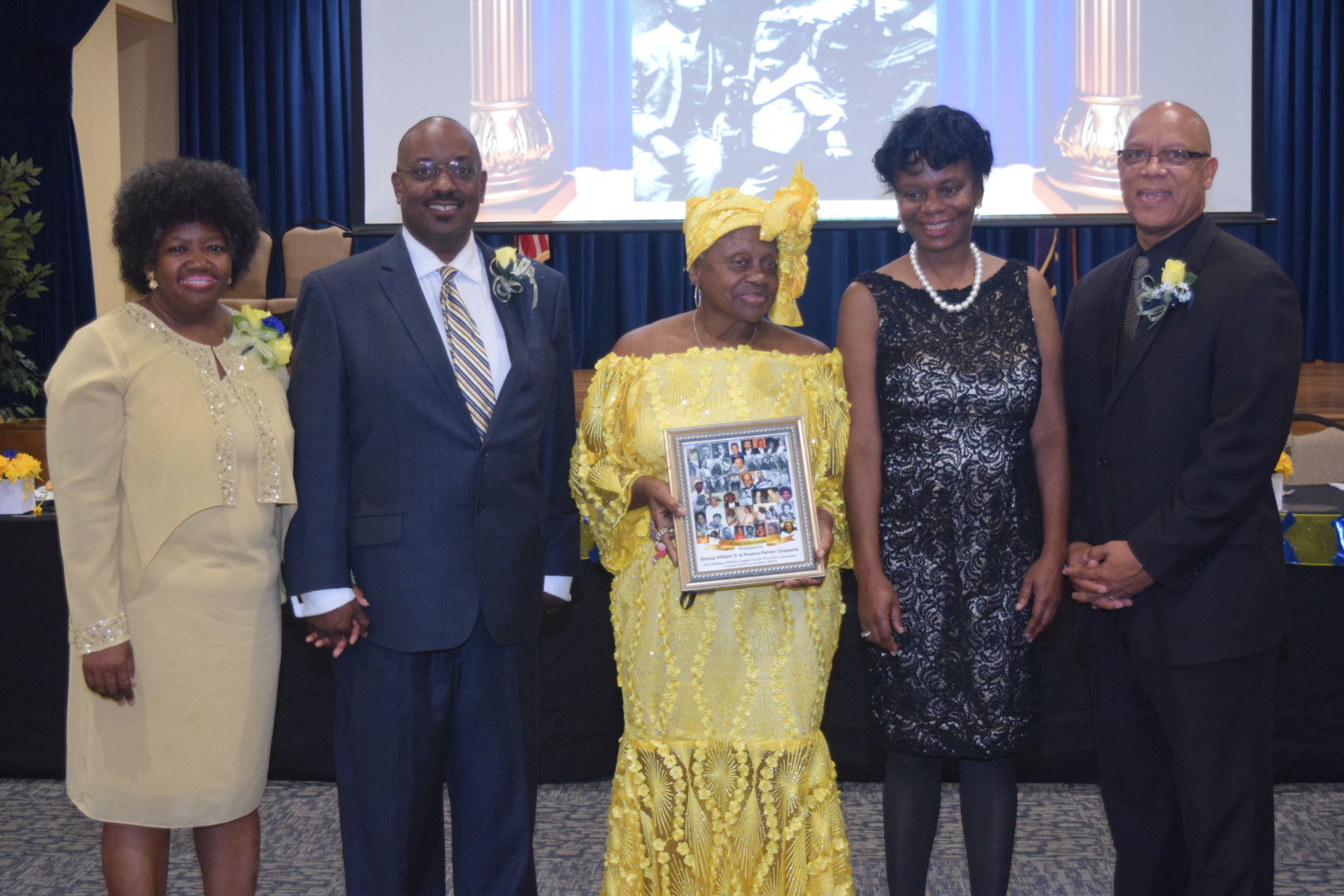Ms. Jean Hopkins fills in for Ms. Vivian Chappelle Robinson who accepts the Legacy Award for Chappelle Building.